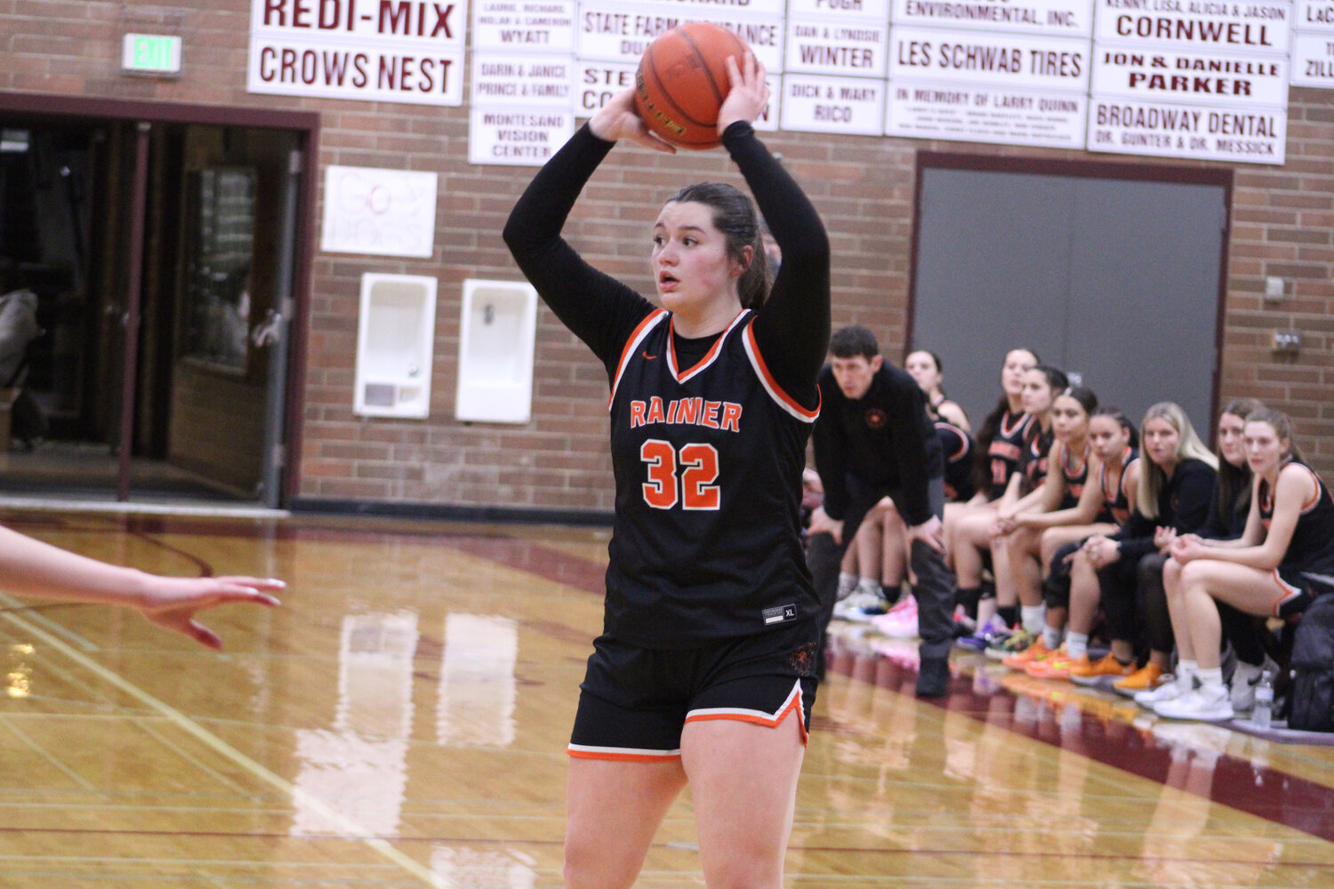 Haleigh Hanson searches for an open teammate in the first half against Raymond-South Bend on Feb. 6.